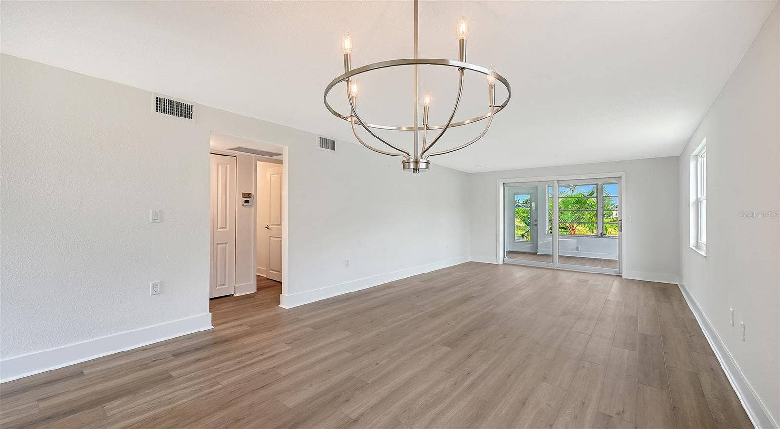 Dining Room/Living Room combination. Hallway to bedrooms.