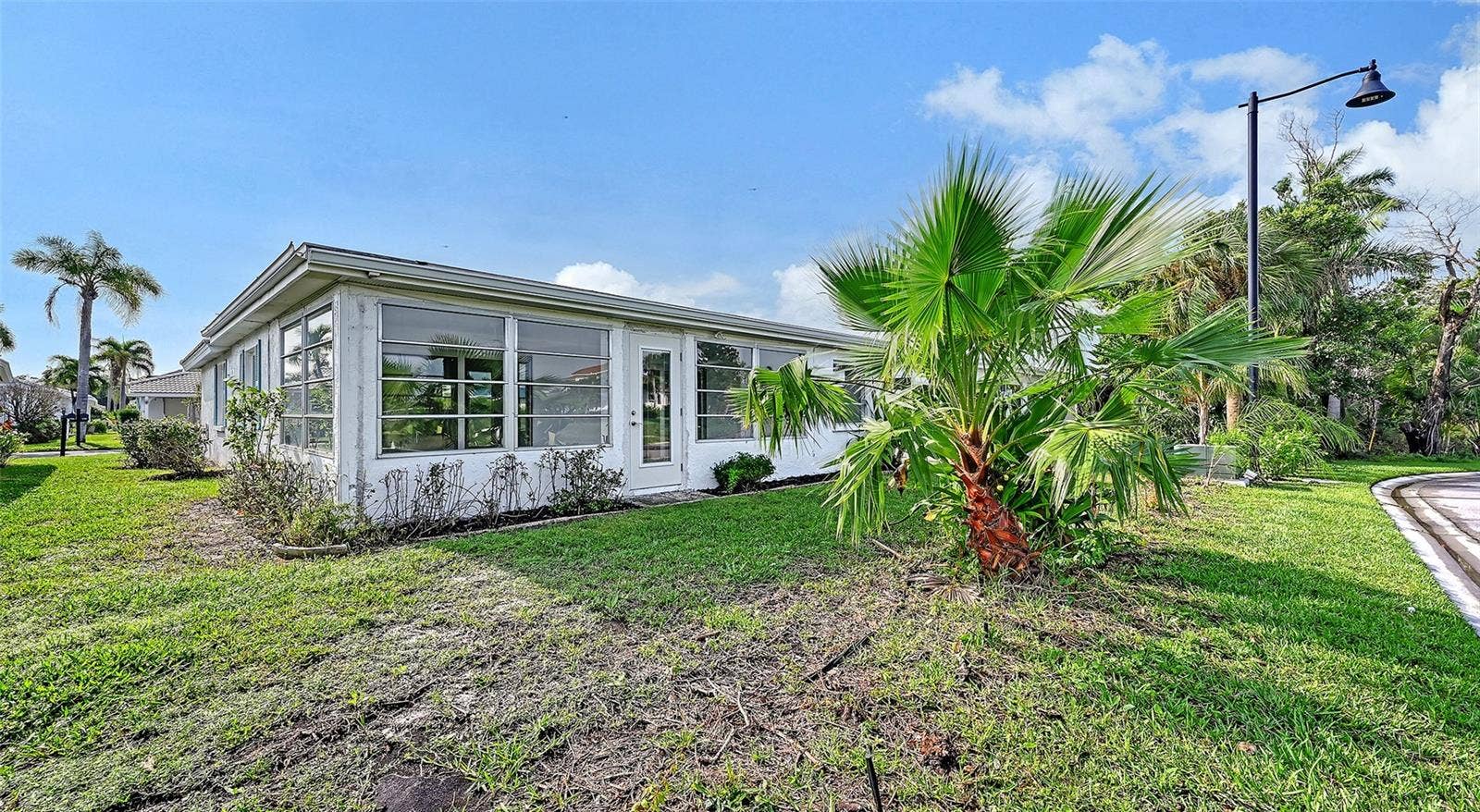 End unit with rear yard.