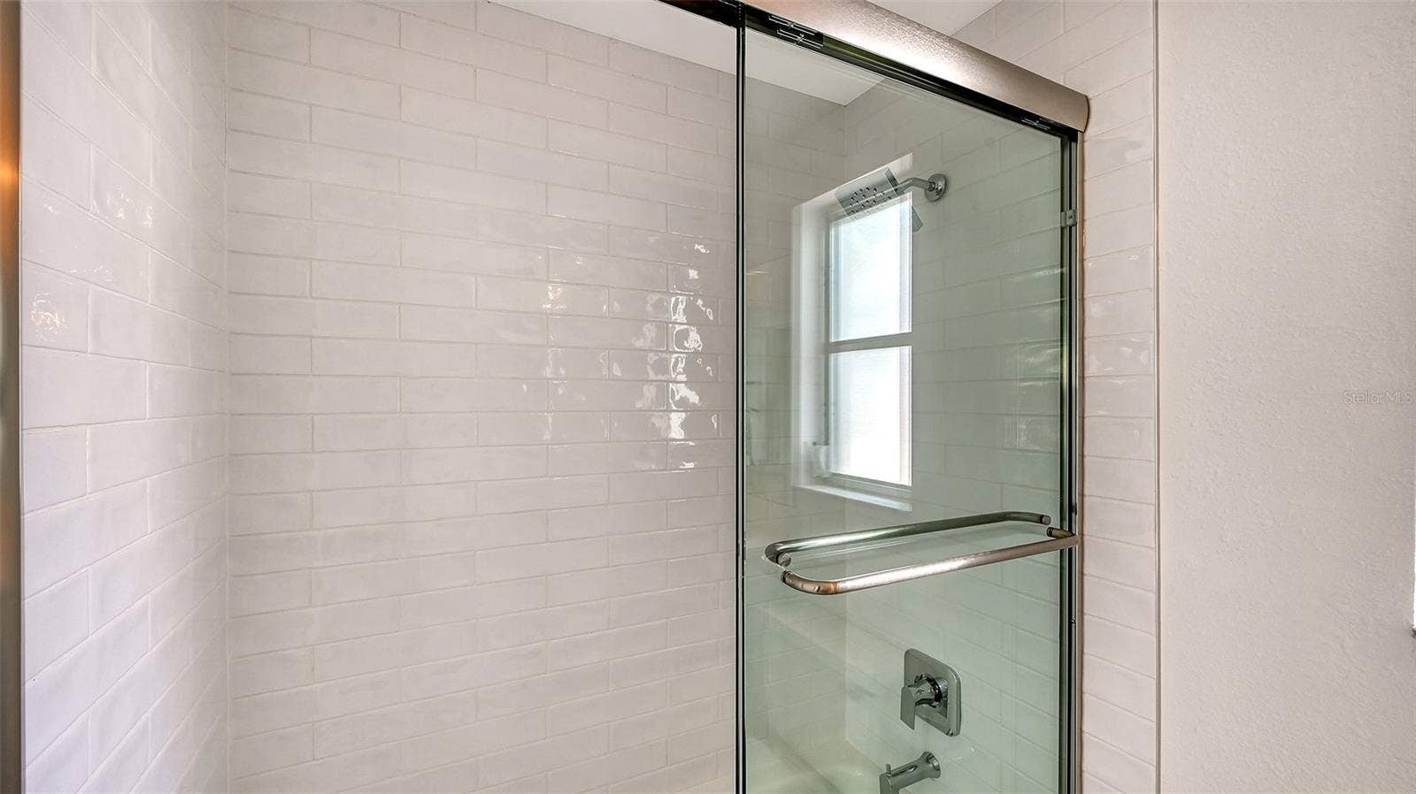 Primary bathroom with tub/shower combo.