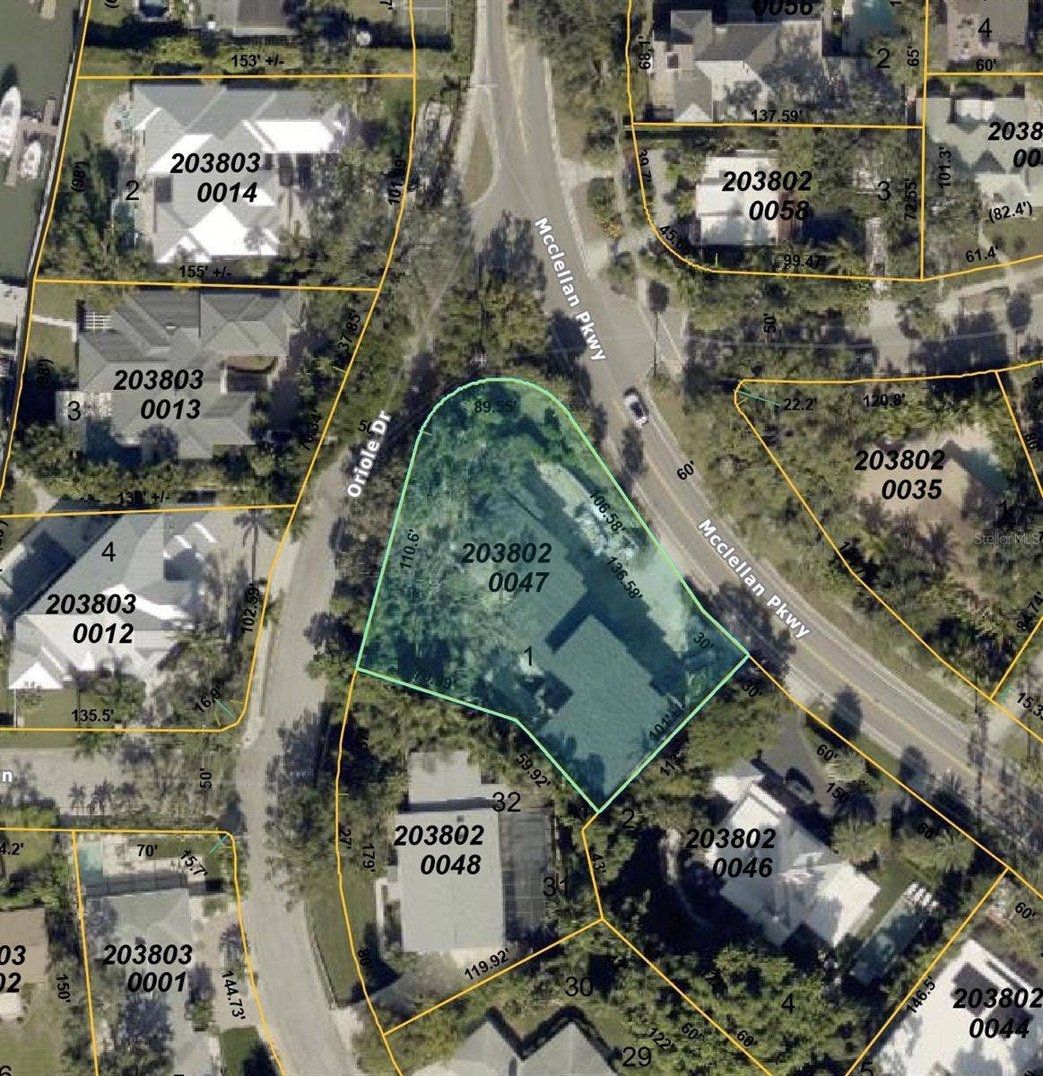 2100 MCCLELLAN PARKWAY, Sarasota, FL 34239 Large lot, with property driveways off McClellan Pkwy and Oriole Dr.