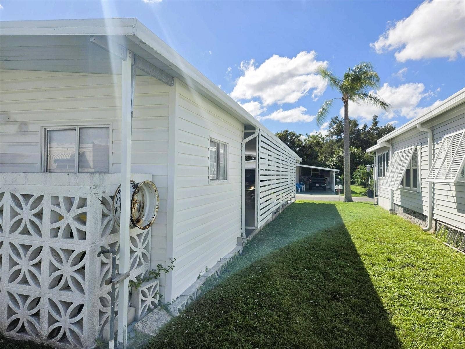 3309 OAKWOOD BOULEVARD N, Sarasota, FL 34237 Left Side of home