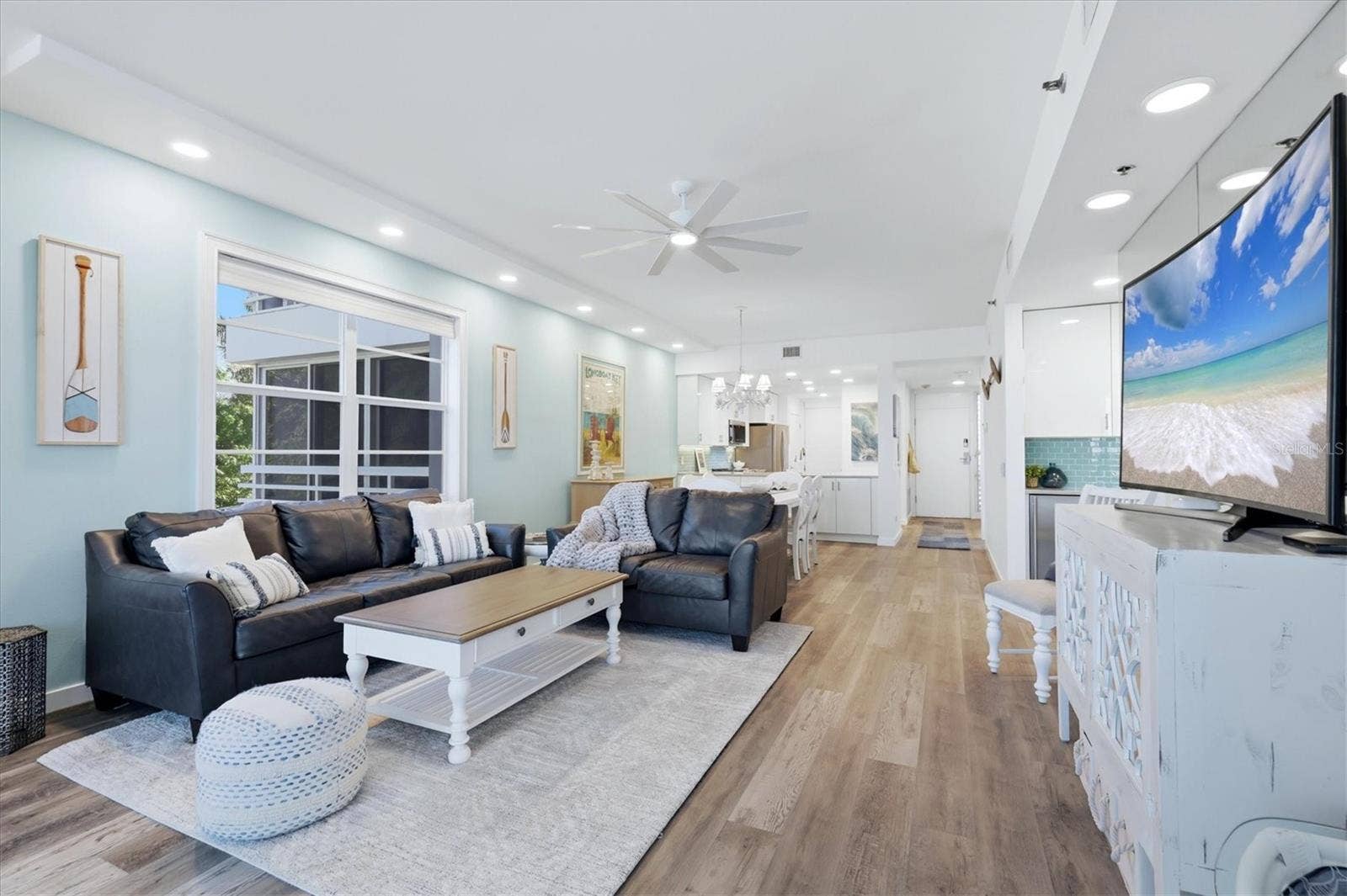 615 DREAM ISLAND PLACE, #212, Longboat Key, FL 34228 Living room looking toward kitchen