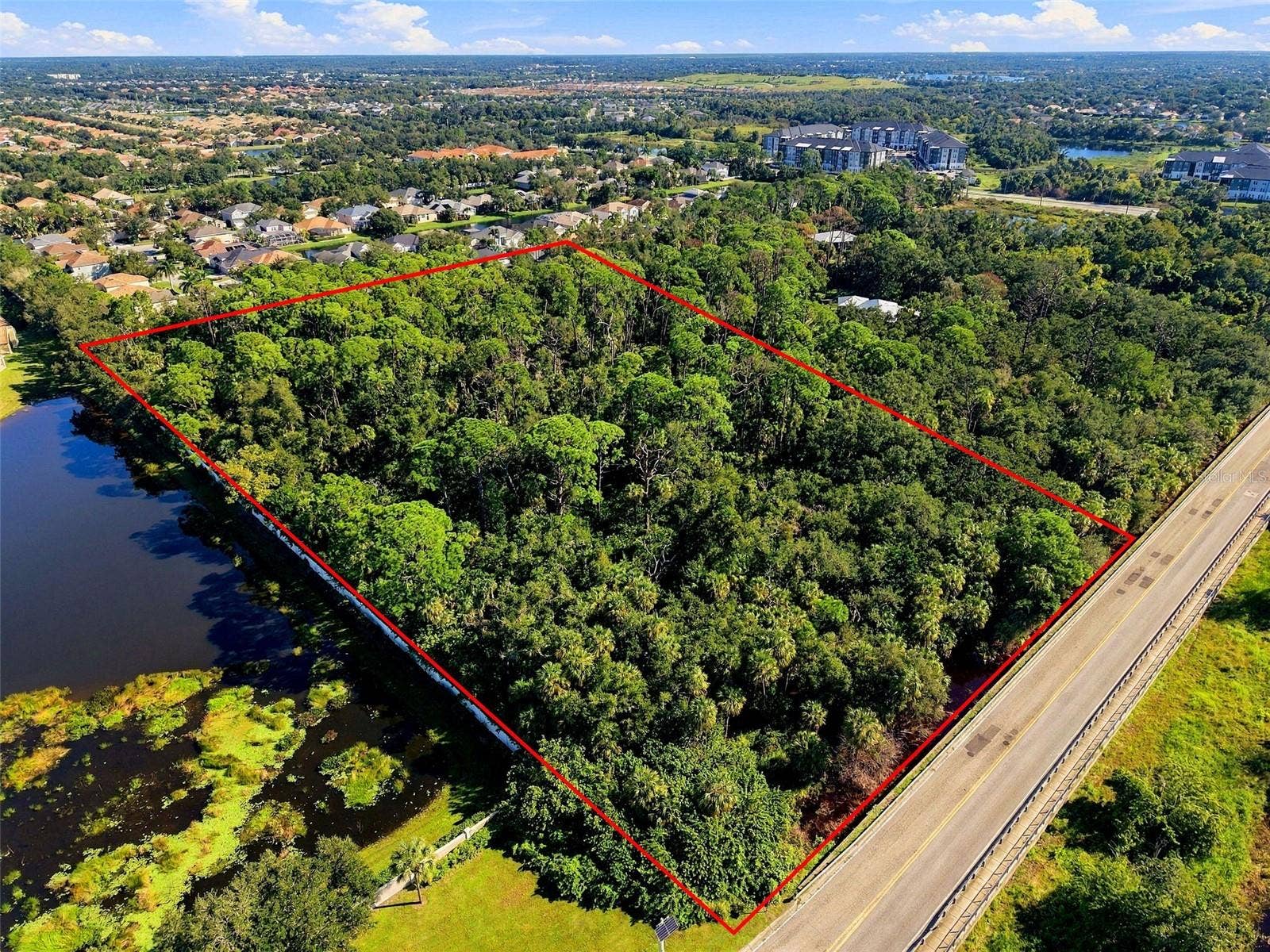68TH AVENUE E, Sarasota, FL 34243 View from SW corner of parcel. South boundary abuts Whitfield Ave.