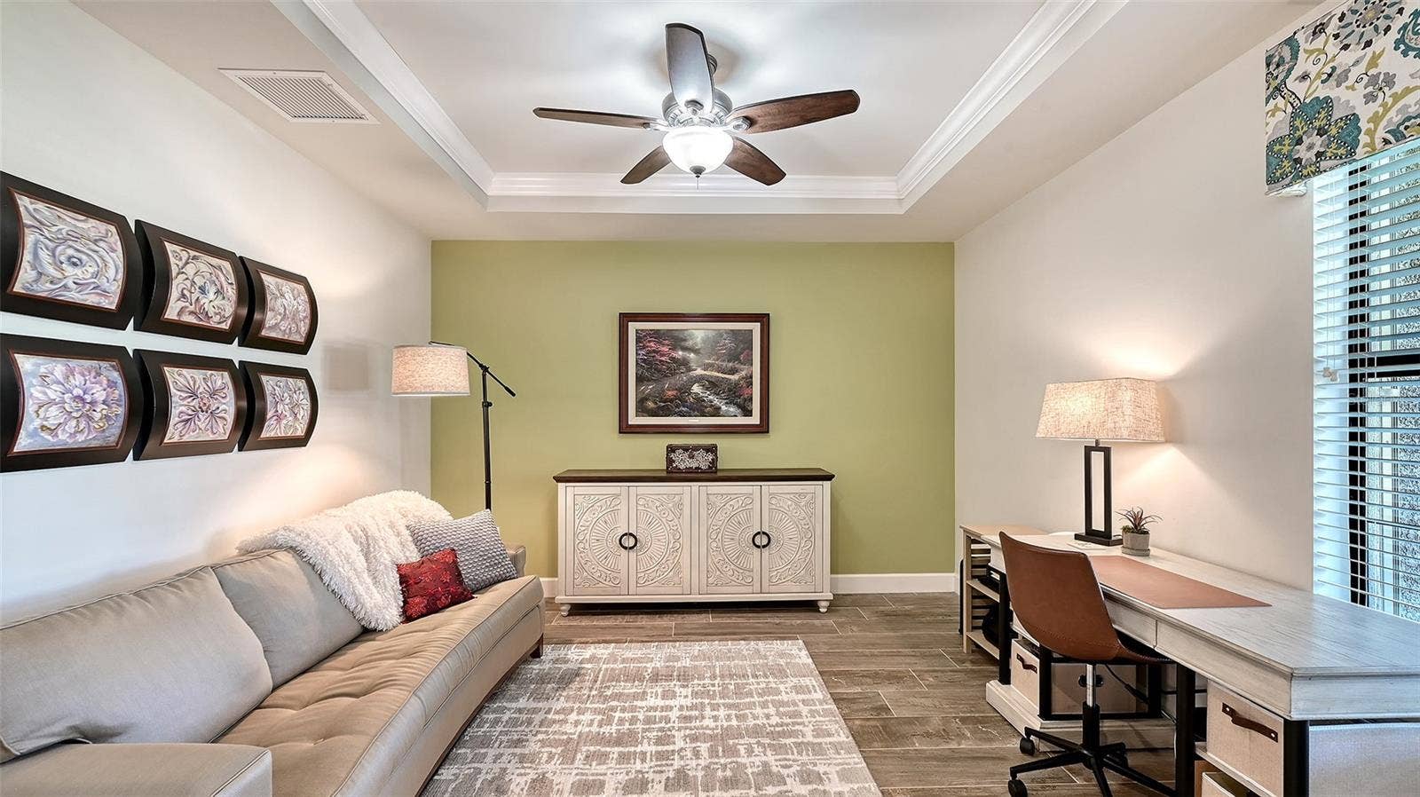 6827 GOSPORT COVE, Bradenton, FL 34202 Study/Den in the front of the home with a tray ceiling gives you privacy to work from home or enjoy this room as a den.