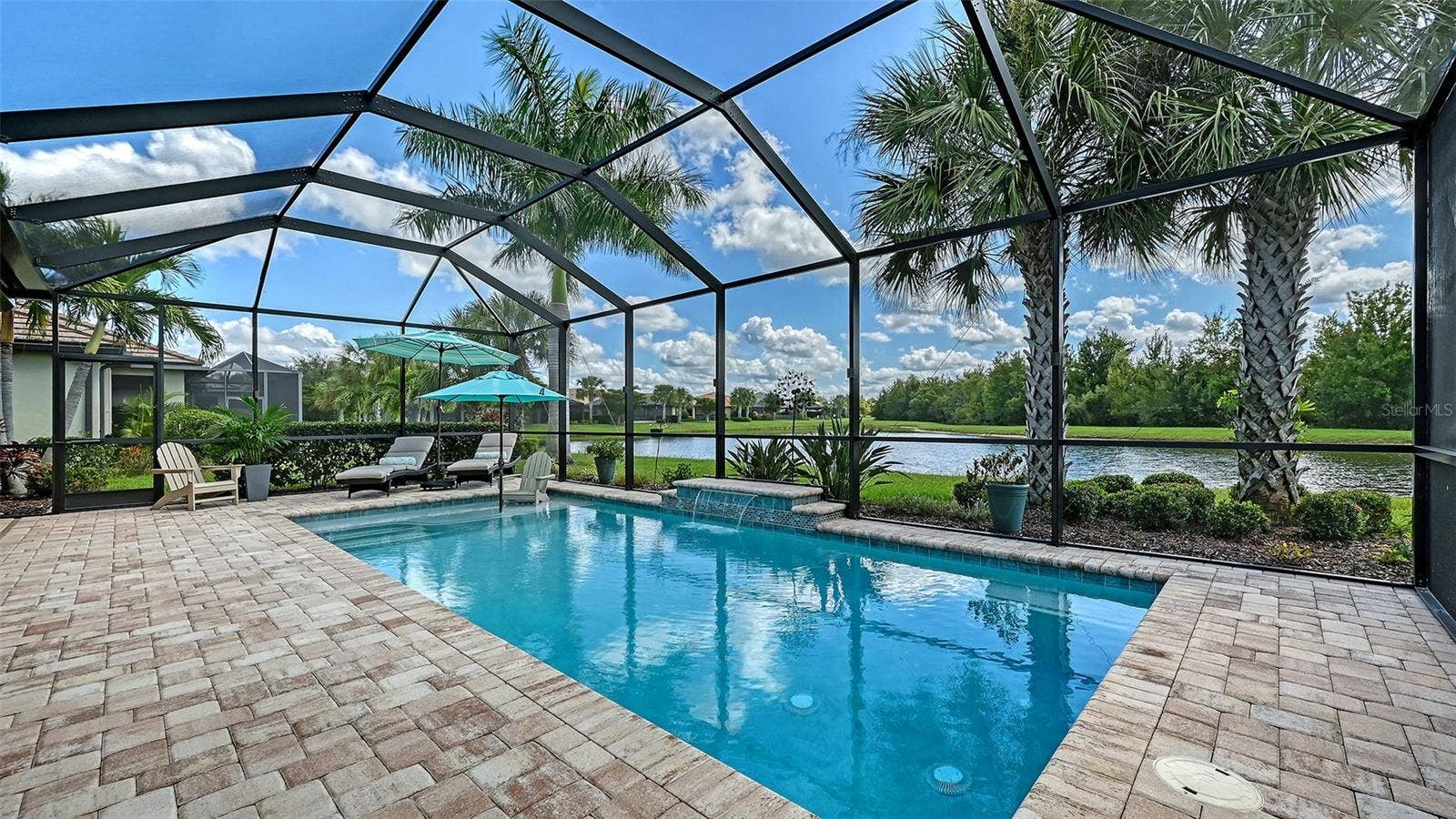 6827 GOSPORT COVE, Bradenton, FL 34202 Designed for effortless entertaining and memorable gatherings.