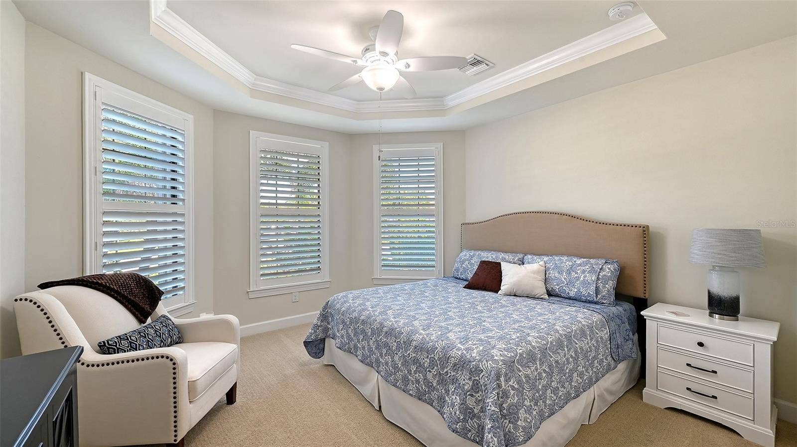 6827 GOSPORT COVE, Bradenton, FL 34202 Seconday bedroom located in the front of the home featuring a large walk-in closet.