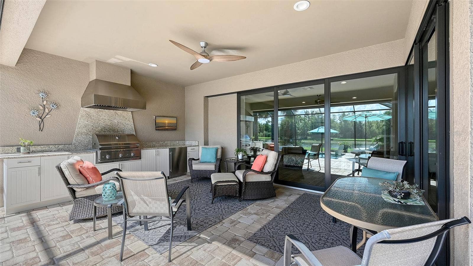 6827 GOSPORT COVE, Bradenton, FL 34202 Entertain guests, host a delightful cookout, or simply unwind poolside as the sparkling pool shimmers in the sunshine.