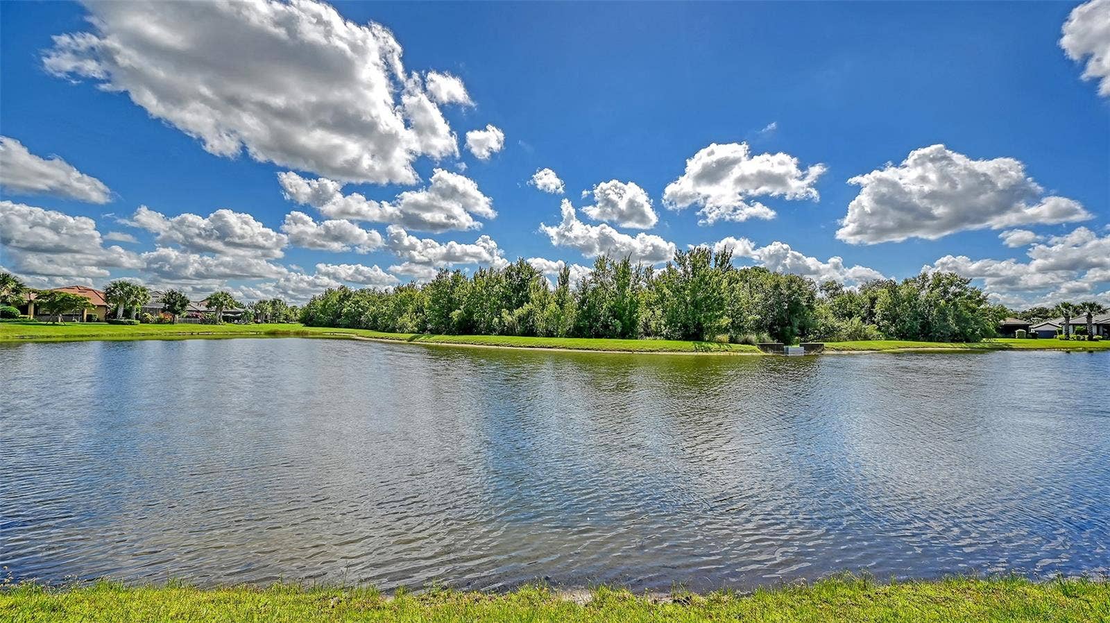 6827 GOSPORT COVE, Bradenton, FL 34202 The spectacular water views create an atmosphere of serenity, warmth, and effortless tranquility.