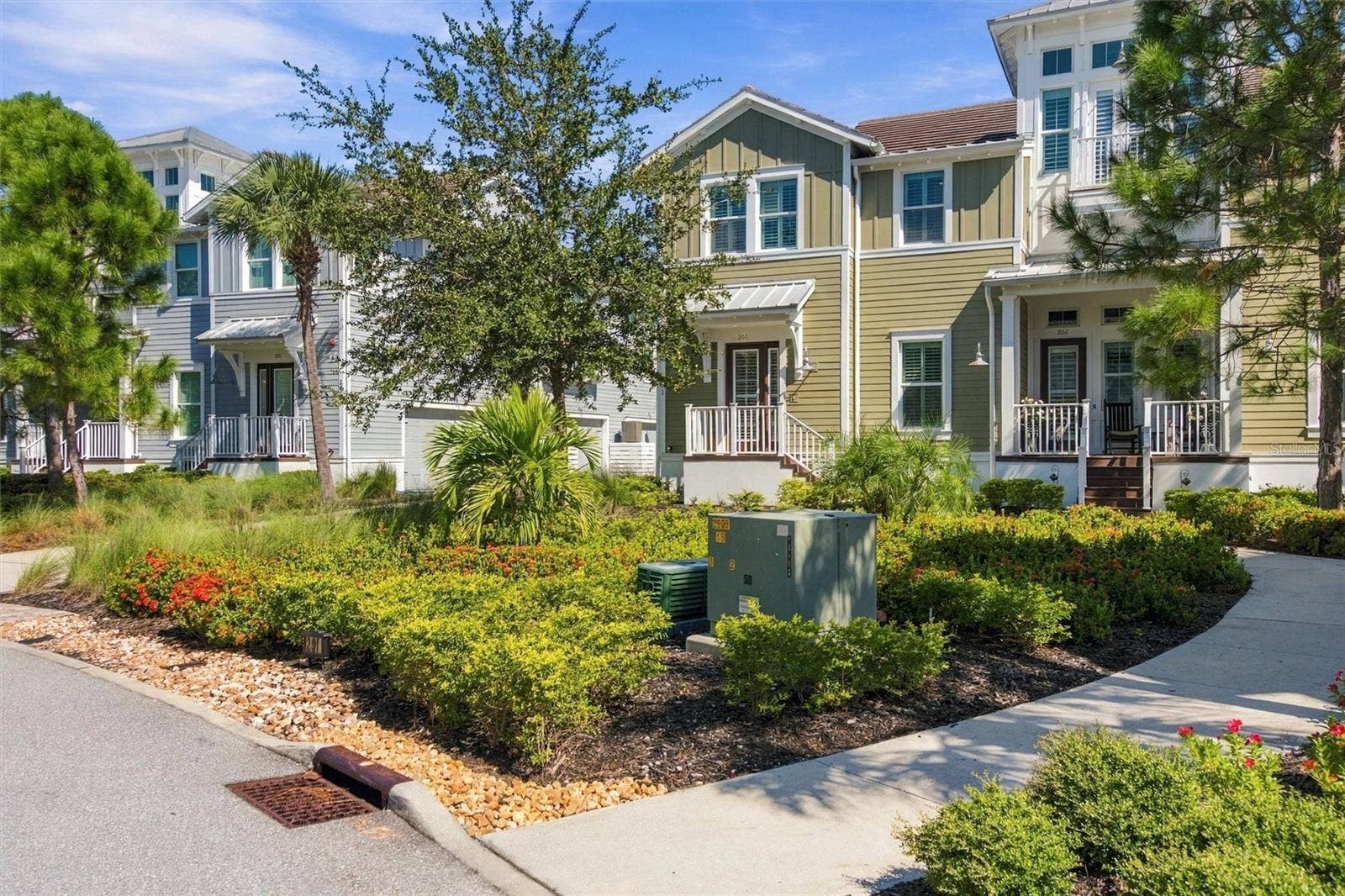 291 COMPASS POINT DRIVE, #201, Bradenton, FL 34209 Beautifully manicured landscaping throughout the neighborhood
