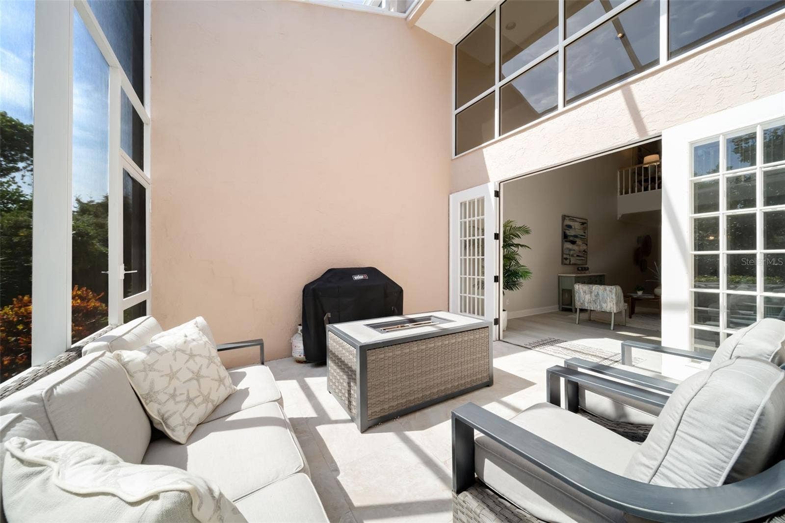 1703 STARLING DRIVE, #1703, Sarasota, FL 34231 Screened in Patio with Fire Pit