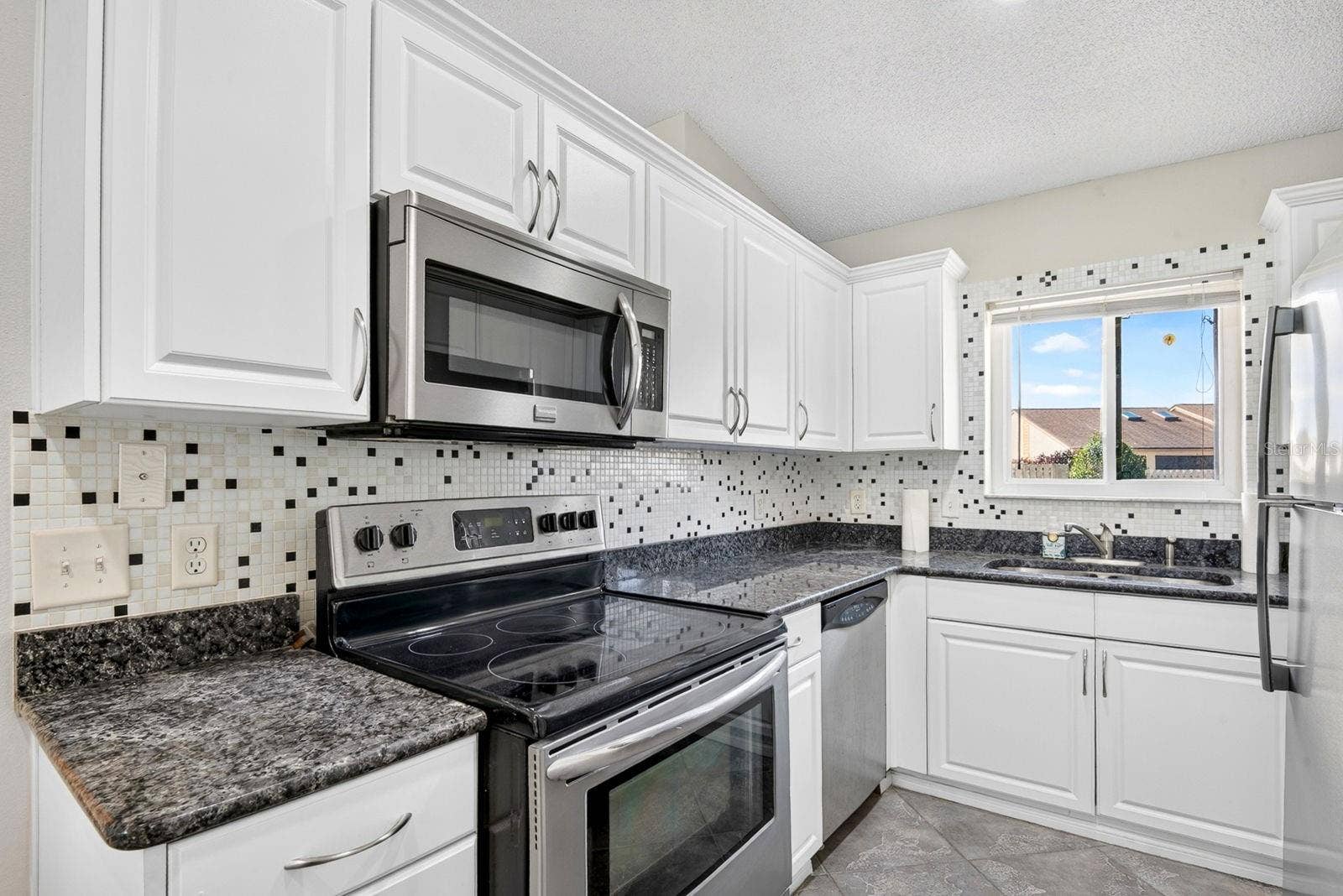 2930 64TH STREET W, #130, Bradenton, FL 34209 Kitchen nice and bright