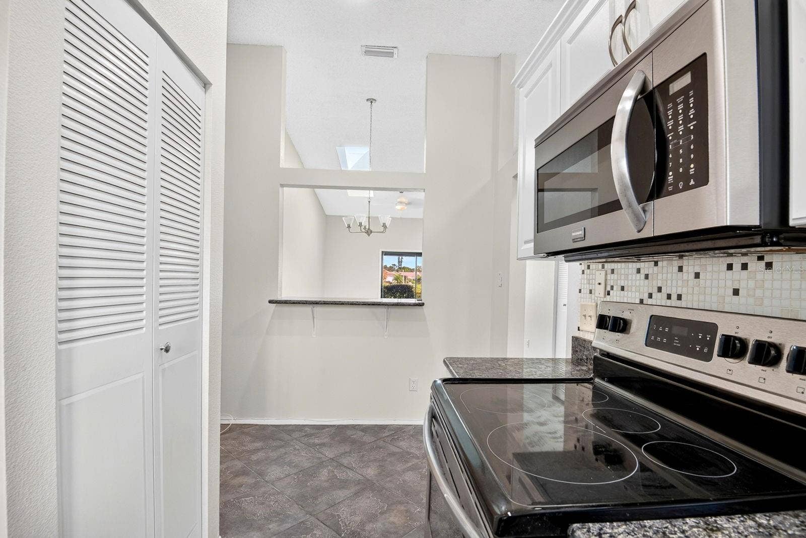 2930 64TH STREET W, #130, Bradenton, FL 34209 Facing into Breakfast nook and dining area