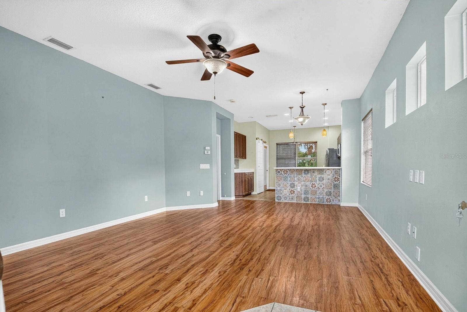 5312 AQUA BREEZE DRIVE, Bradenton, FL 34208 Living and Dining area facing into home
