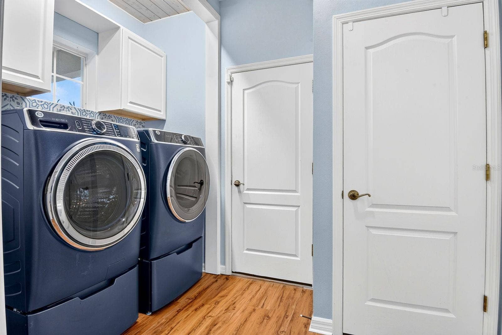 5312 AQUA BREEZE DRIVE, Bradenton, FL 34208 Laundry area by guest bedroom and garage door