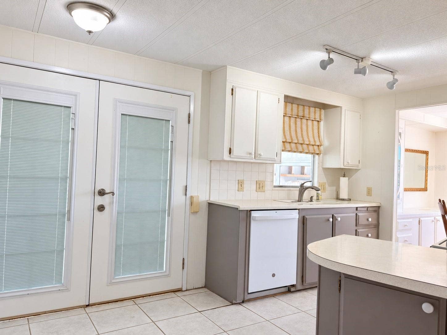 Kitchen with French entry doors