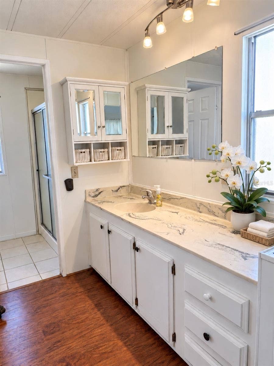 Dressing area of Prime bathroom leading into the shower