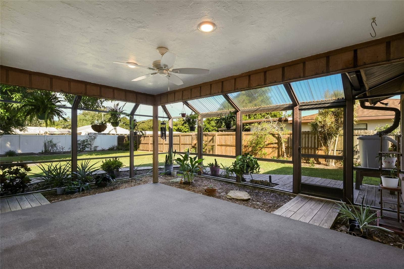 204 46TH STREET NW, Bradenton, FL 34209 Covered, screened in lanai with fan and lighting