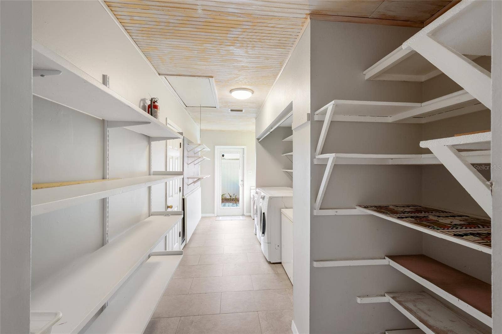 204 46TH STREET NW, Bradenton, FL 34209 Interior Laundry room w/ built in shelving