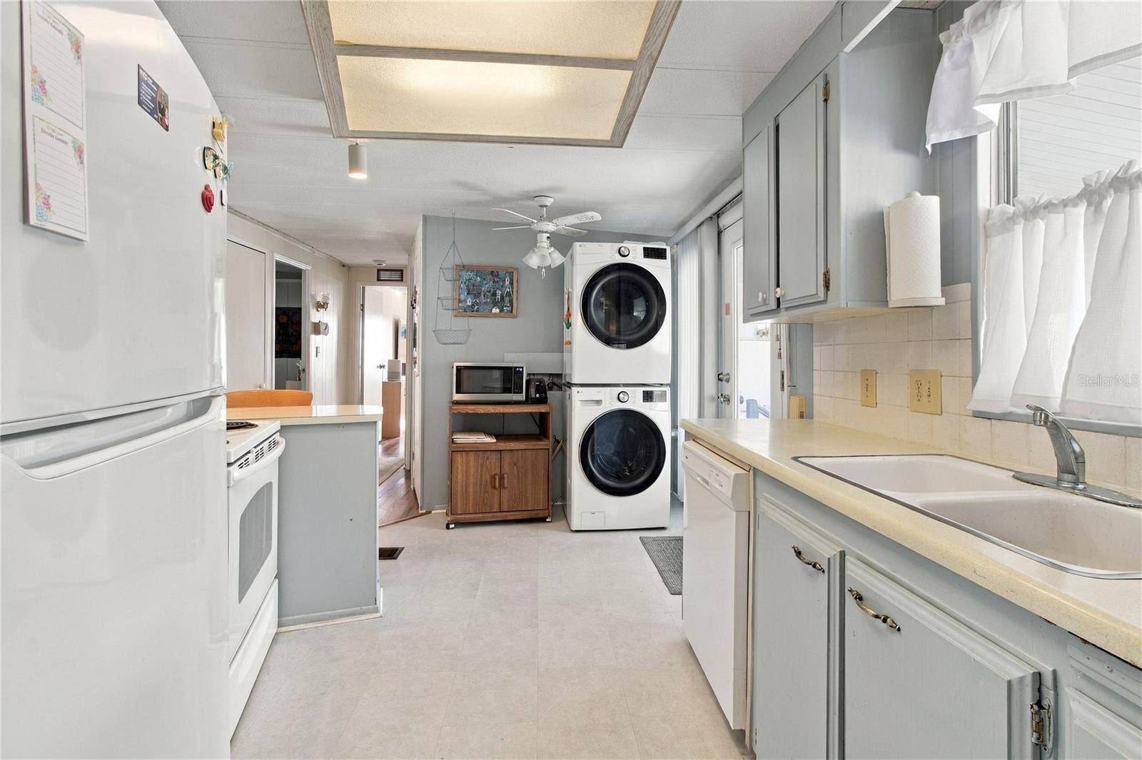 808 53RD AVENUE E, #19, Bradenton, FL 34203 Washer and Dryer are in Kitchen.