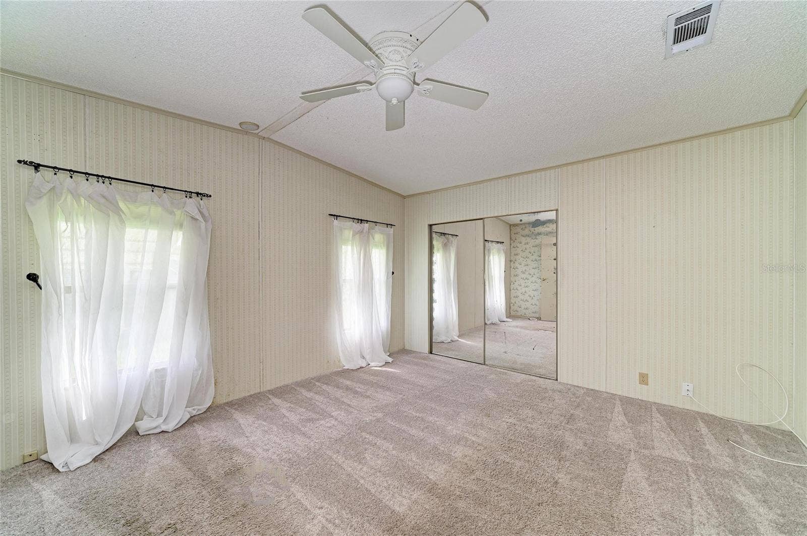 42 MEADOWLARK CIRCLE, Ellenton, FL 34222 Primary bedroom with good size walk-in closet