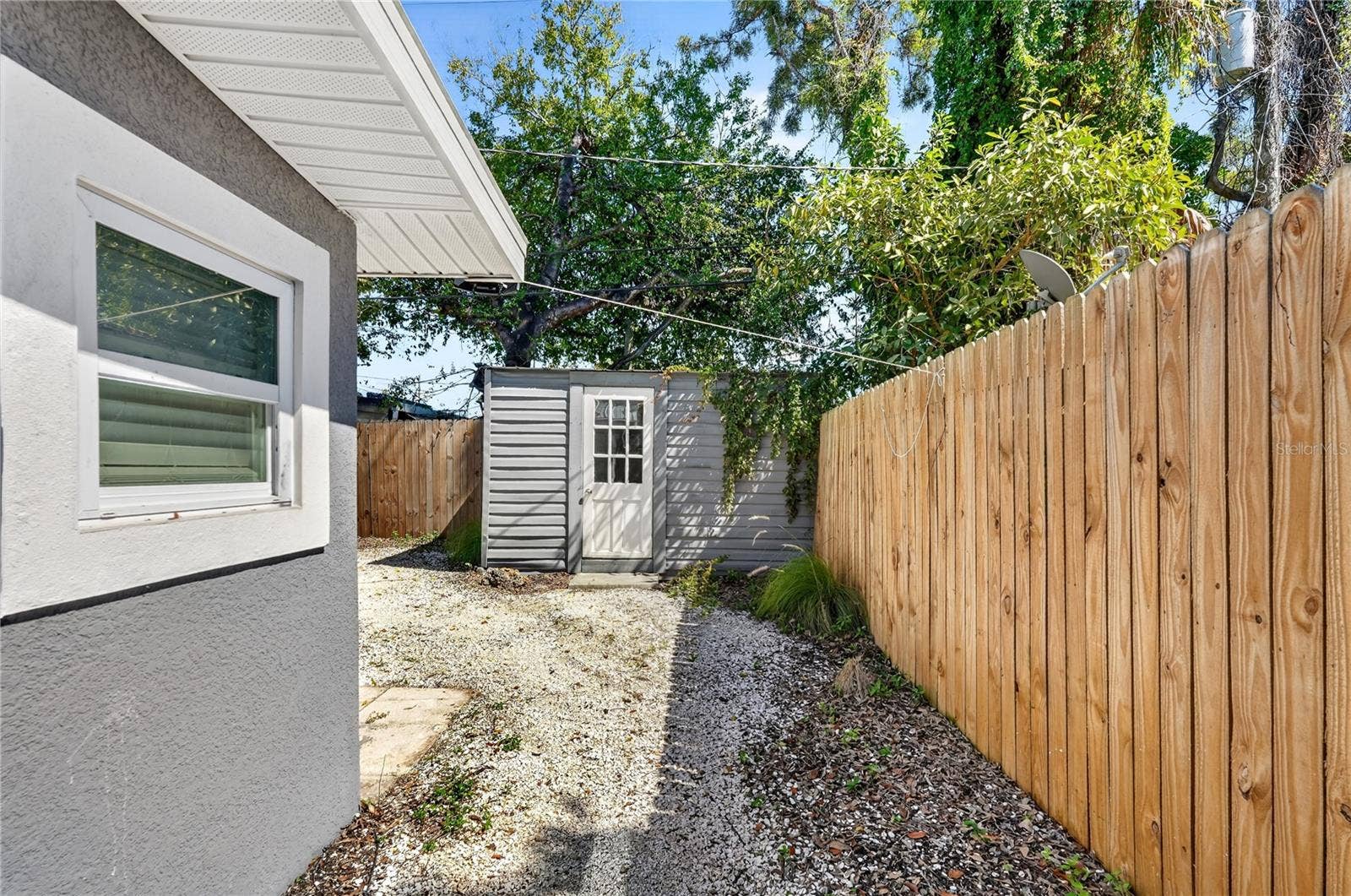 3717 16TH STREET W, Bradenton, FL 34205 Backyard with shed