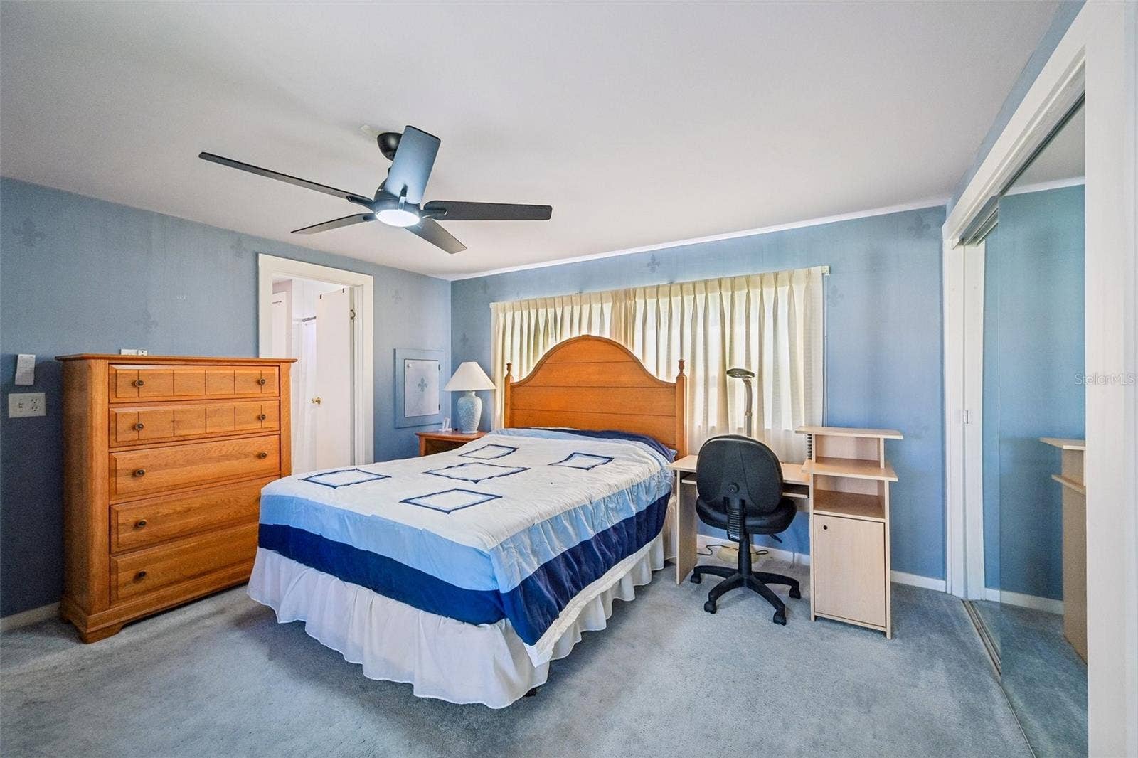 8455 ALBATROSS LANE, Englewood, FL 34224 Large primary bedroom with its own en-suite