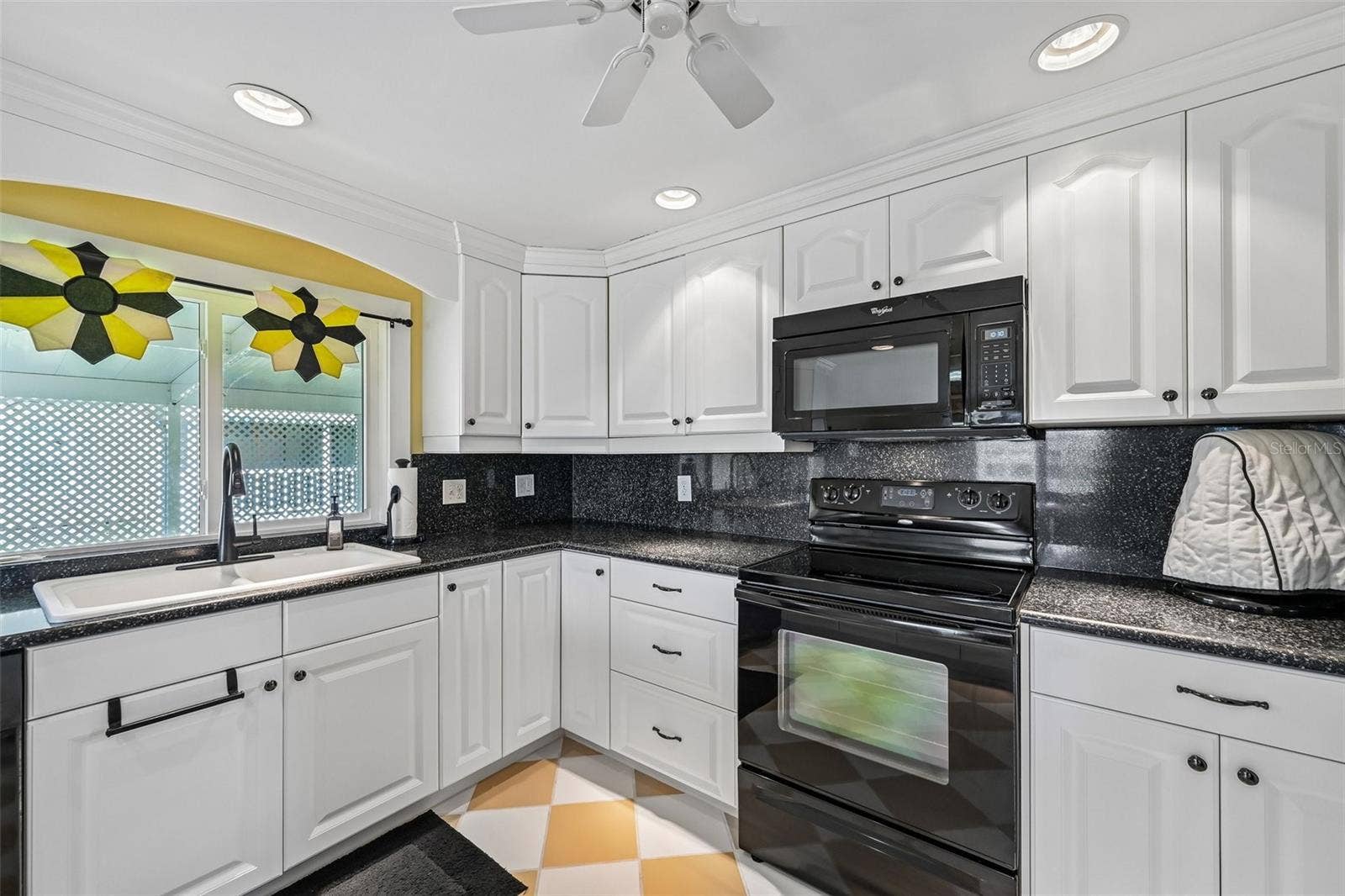 8455 ALBATROSS LANE, Englewood, FL 34224 So many cabinets for storage!