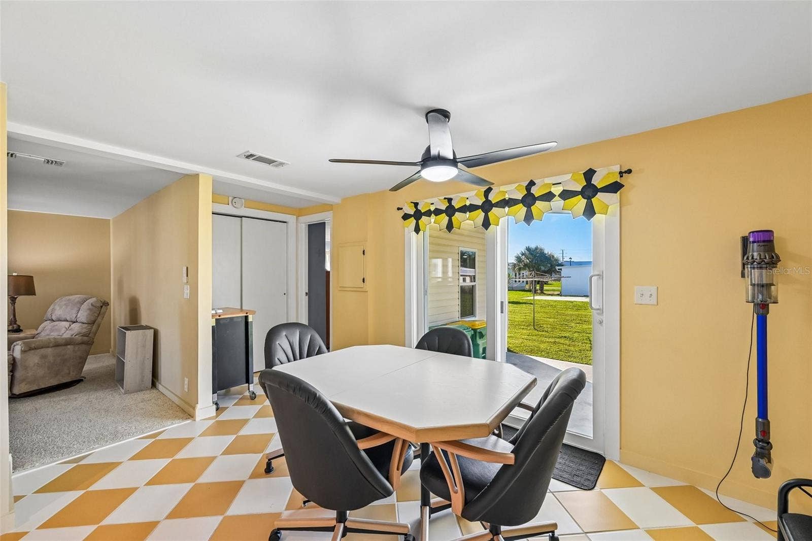 8455 ALBATROSS LANE, Englewood, FL 34224 Eat-in kitchen with sliders to covered back patio