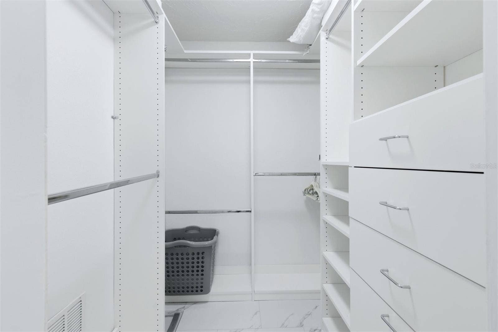 5655 GULF OF MEXICO DRIVE, #A107, Longboat Key, FL 34228 Walk in closet Primary Bedroom