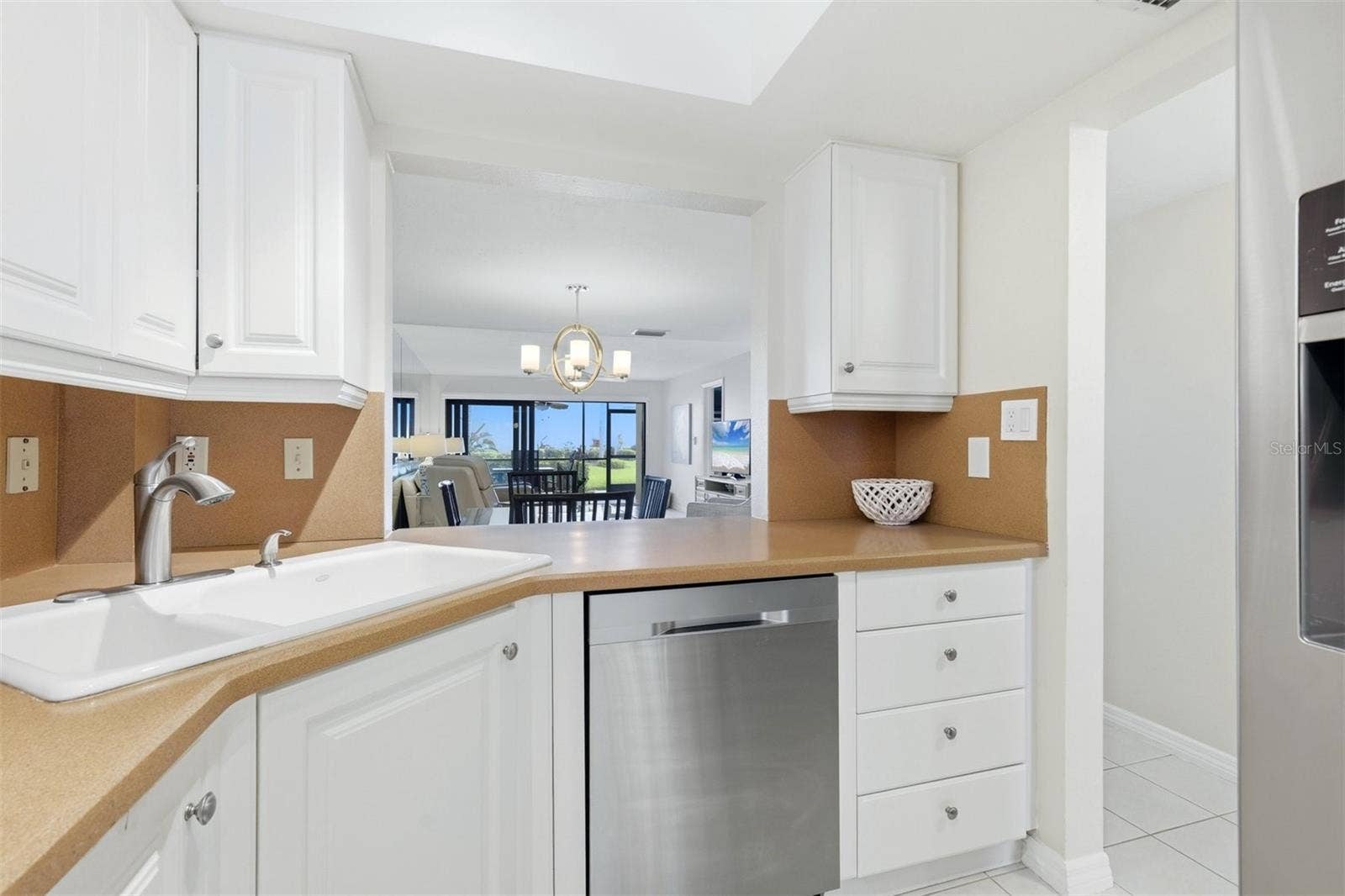 5655 GULF OF MEXICO DRIVE, #A107, Longboat Key, FL 34228 Pass through kitchen with water views