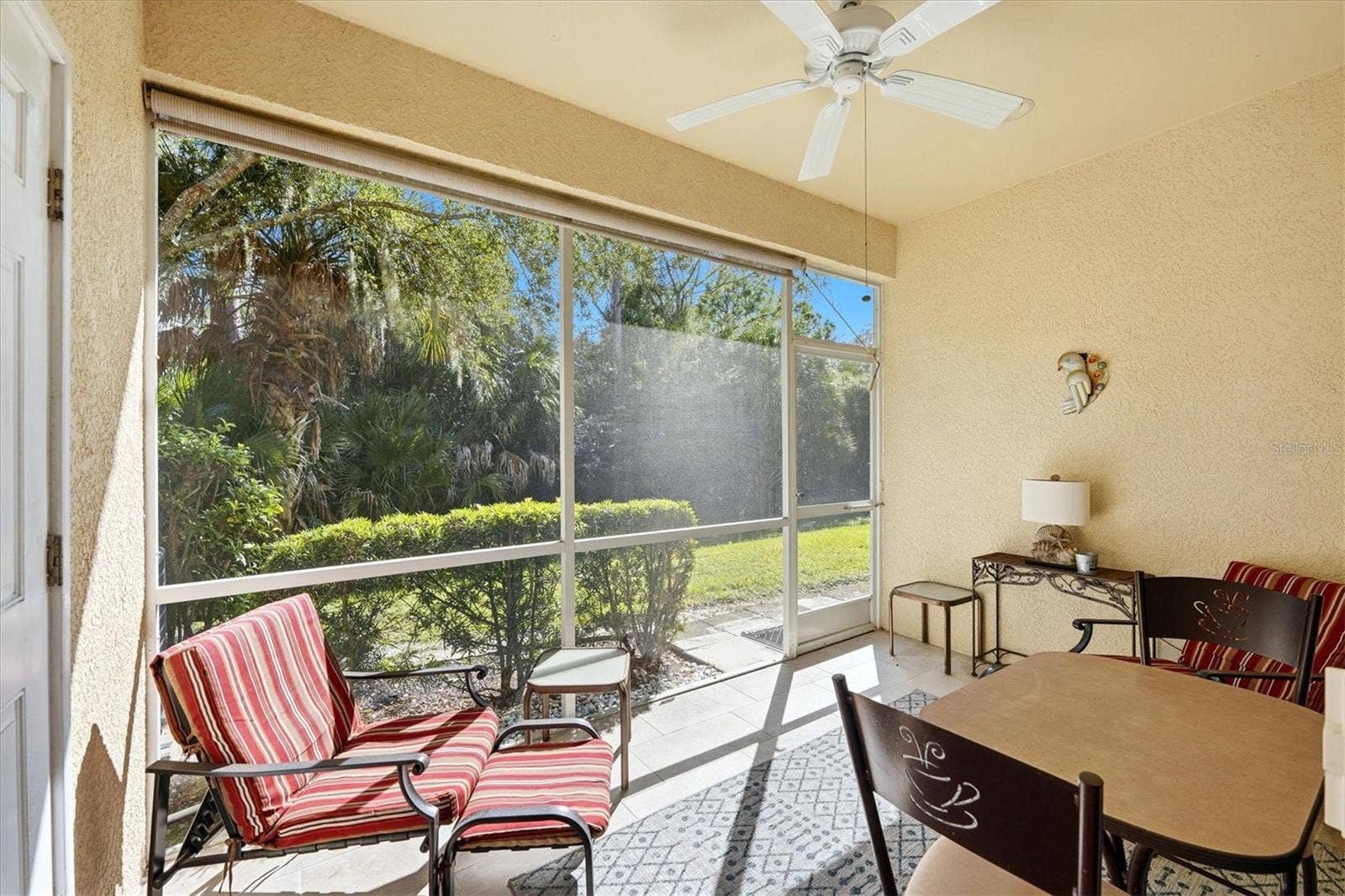 1153 JONAH DRIVE, North Port, FL 34289 Covered lanai with tile floor.