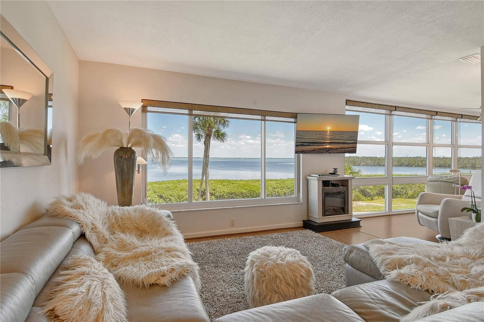 4800 GULF OF MEXICO DRIVE, #205, Longboat Key, FL 34228 Living Area with Fireplace