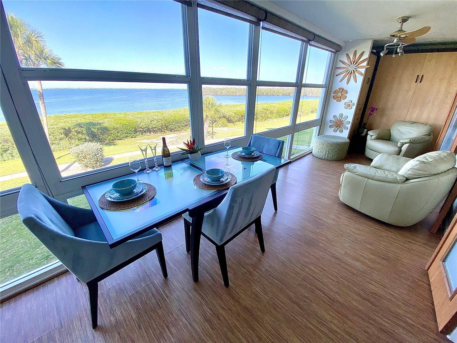 4800 GULF OF MEXICO DRIVE, #205, Longboat Key, FL 34228 Sarasota Bay Dining in Florida Room. Bonus Queen Size Murphy Bed and Guest Closet!