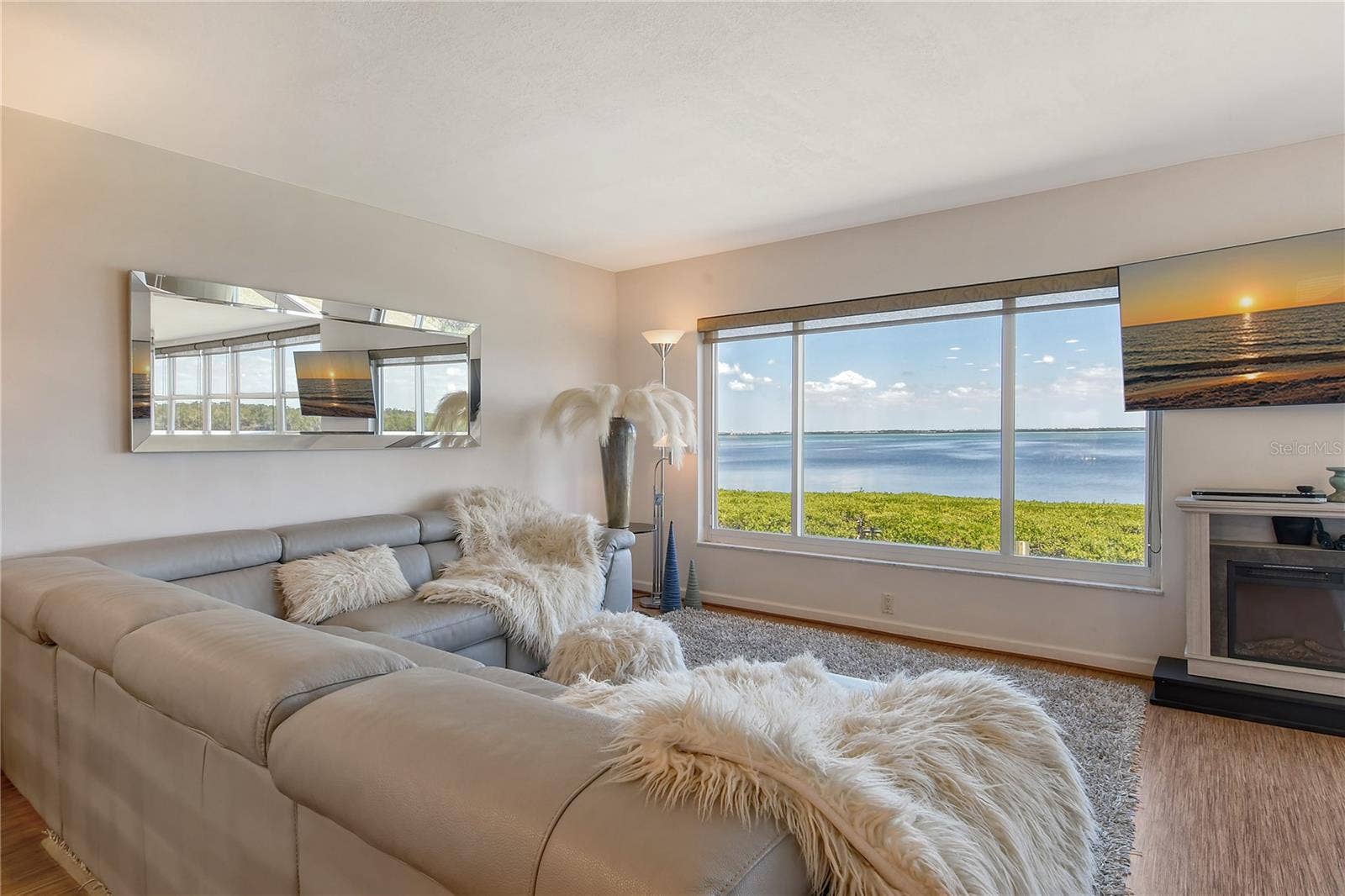 4800 GULF OF MEXICO DRIVE, #205, Longboat Key, FL 34228 Living Area with Fireplace