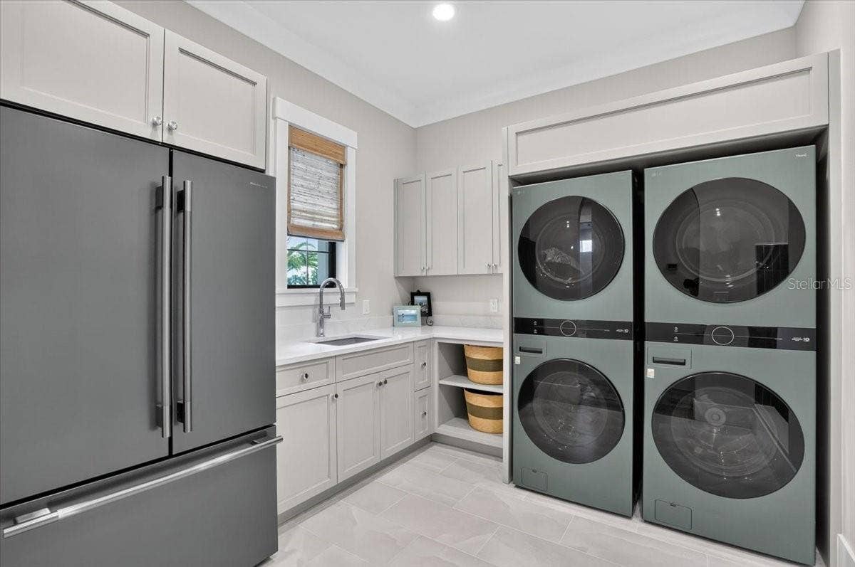 1625 RIO VISTA TERRACE, Parrish, FL 34219 Dual double stack Washer and Dryer. Color matched refrigerator.