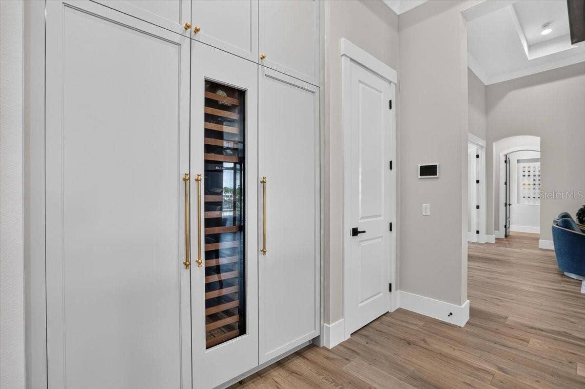 1625 RIO VISTA TERRACE, Parrish, FL 34219 Sub Zero Freezer (left) Wine Fridge (center) Refrigerator (right)
