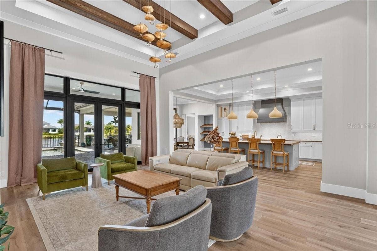 1625 RIO VISTA TERRACE, Parrish, FL 34219 Wood Beams, Designer Lighting and Custom PGT French Doors