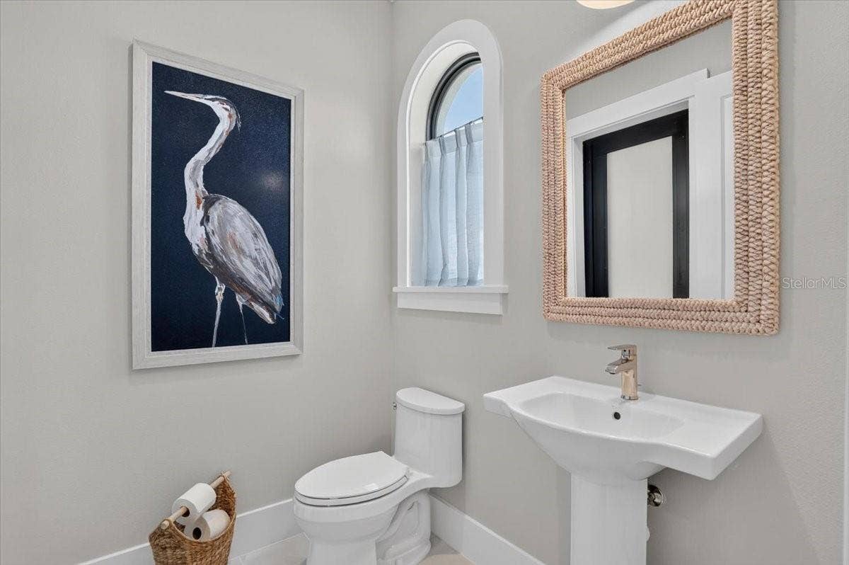 1625 RIO VISTA TERRACE, Parrish, FL 34219 Guest/Pool Bath: Backlit mirror, Floating Vanity and Linen Closet