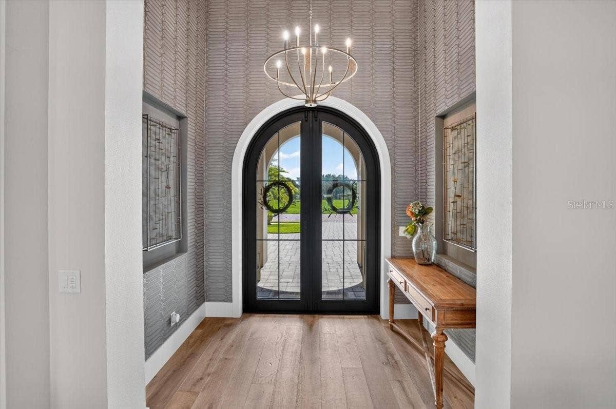 1625 RIO VISTA TERRACE, Parrish, FL 34219 Custom made in Italy, 10' Impact Glass and Iron doors.