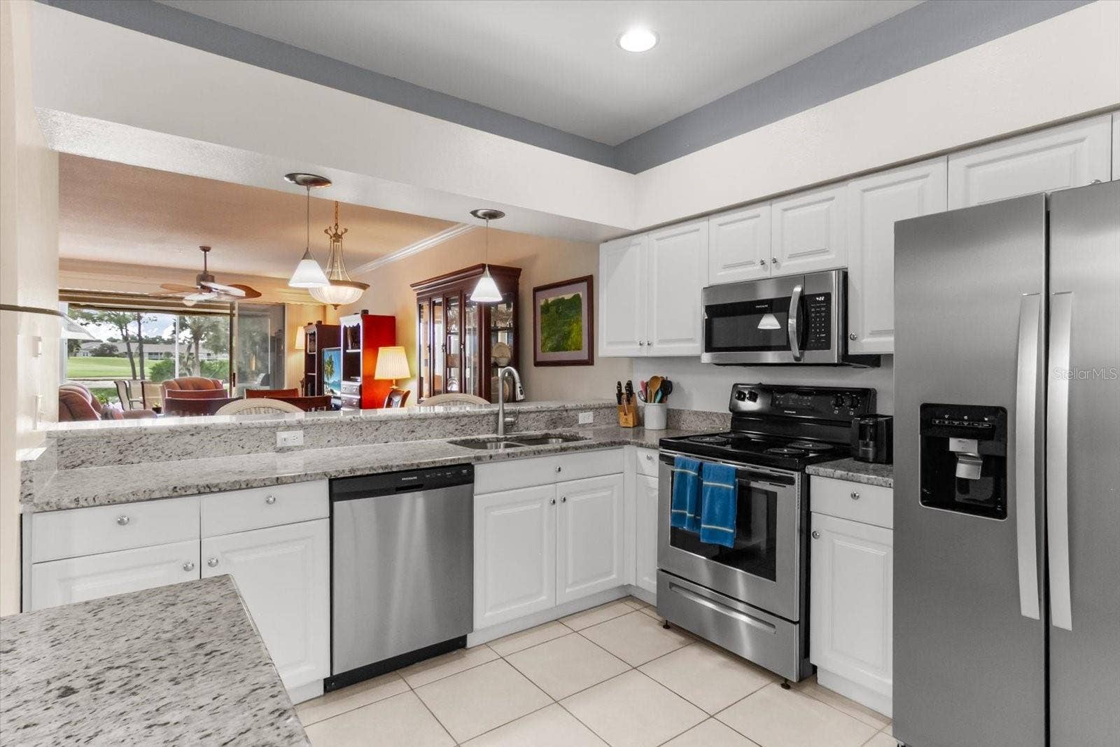 5288 MAHOGANY RUN AVENUE, Sarasota, FL 34241 Kitchen overlook into dining and living room