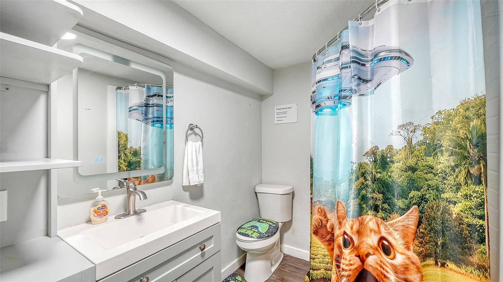 2514 AVENUE B, Bradenton Beach, FL 34217 Converted garage bathroom/storage space.