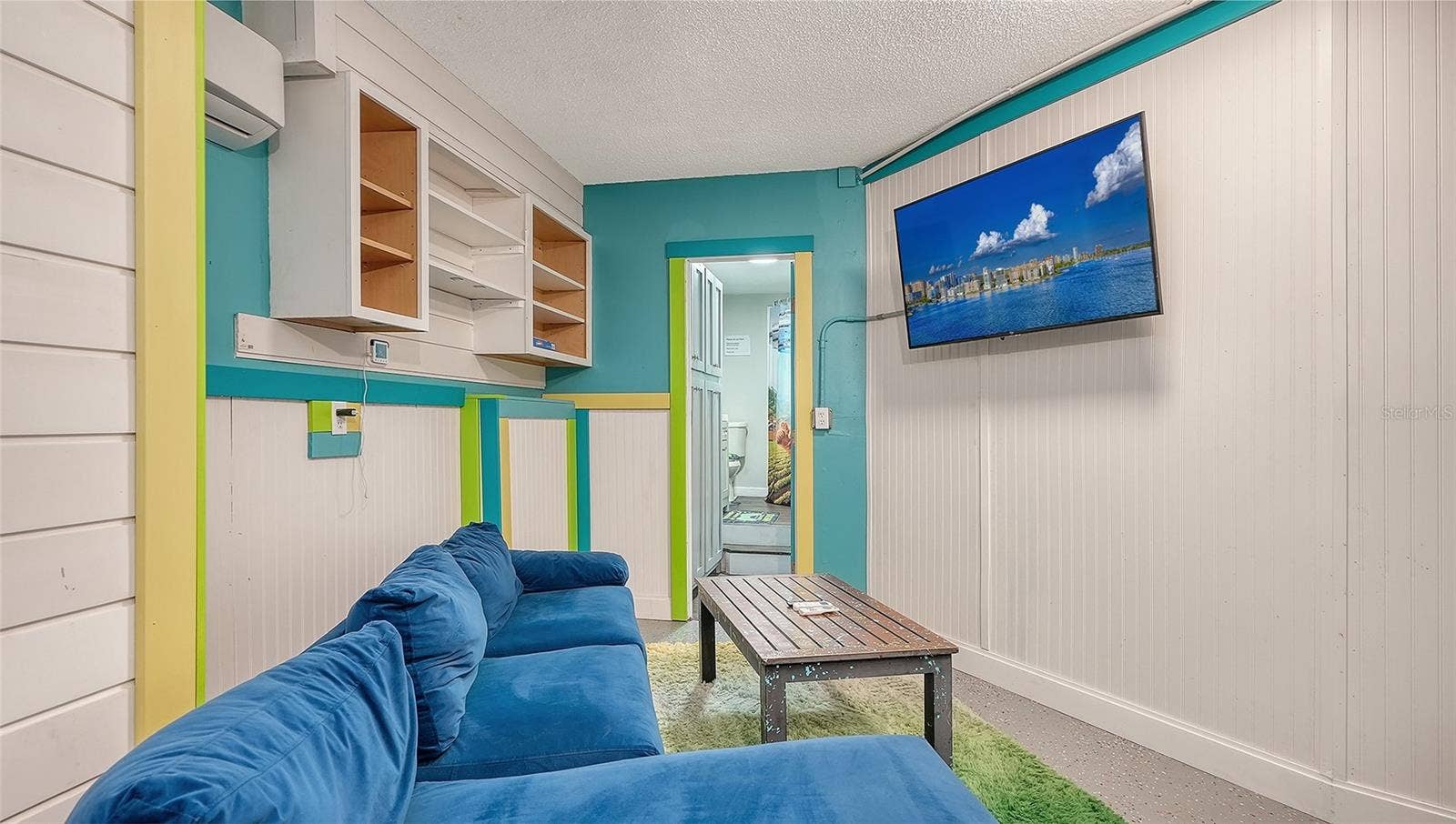 2514 AVENUE B, Bradenton Beach, FL 34217 Ground floor under Unit B, converted garage to game or rec room/storage space.