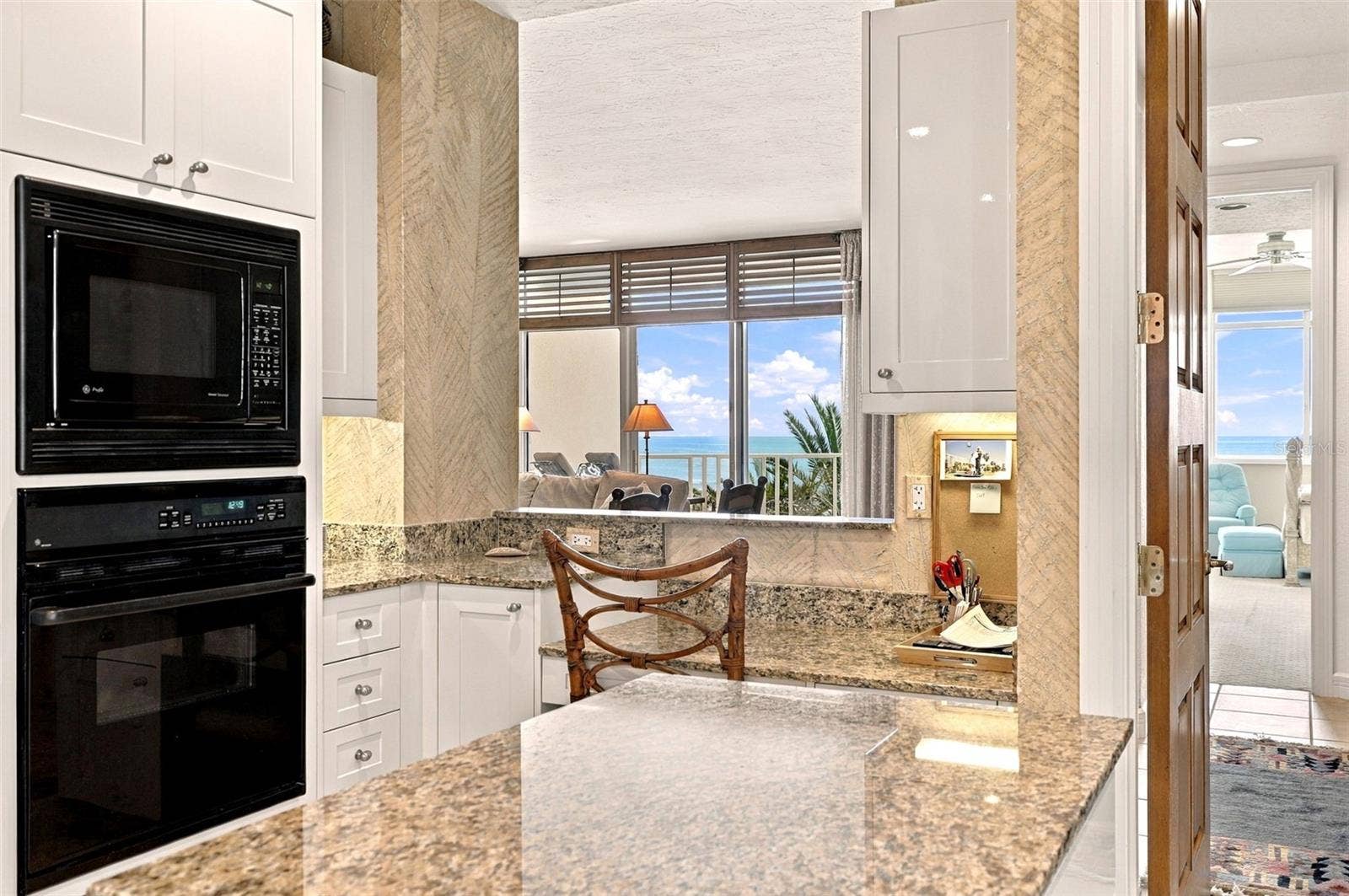 2185 GULF OF MEXICO DRIVE, #243, Longboat Key, FL 34228 Enjoy the Gulf views from the kitchen.