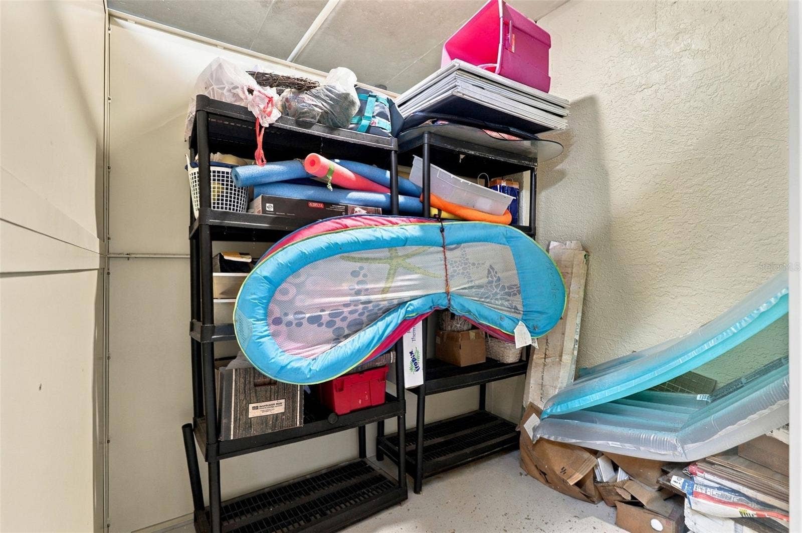 2185 GULF OF MEXICO DRIVE, #243, Longboat Key, FL 34228 Private storage unit in the garage.