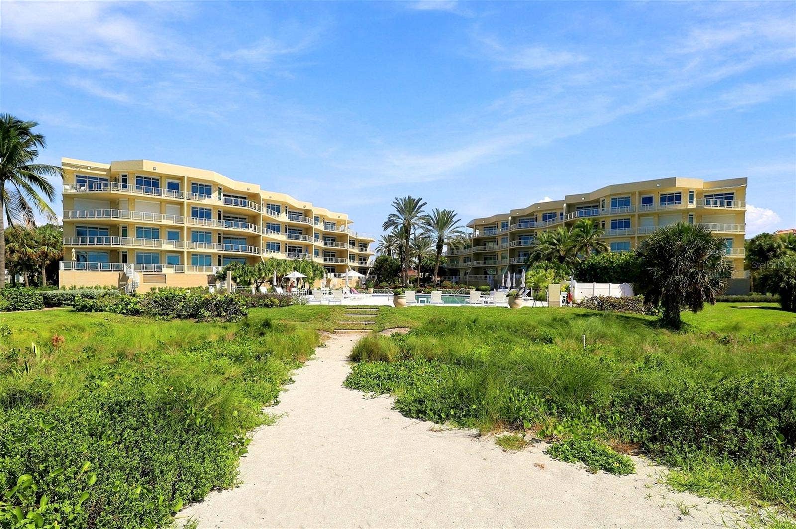 2185 GULF OF MEXICO DRIVE, #243, Longboat Key, FL 34228 Easy access to the pristine beach and clear waters of the Gulf.