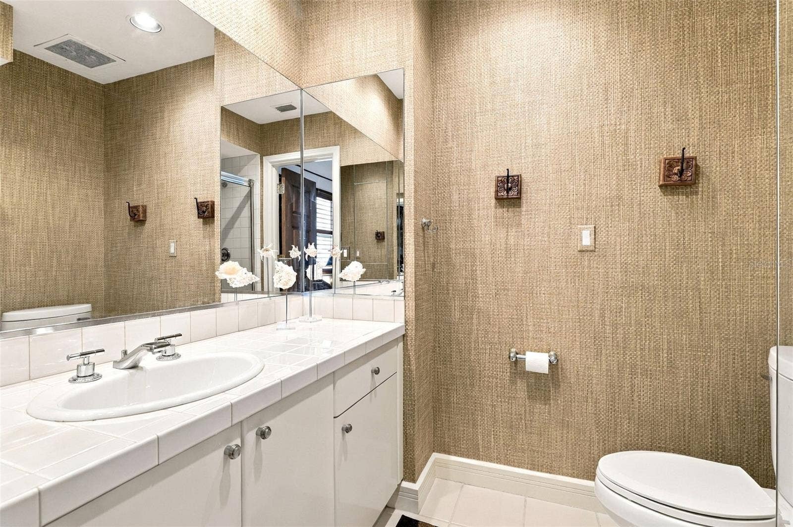 2185 GULF OF MEXICO DRIVE, #243, Longboat Key, FL 34228 Bathroom 2 offers a stand-alone shower and single vanity.