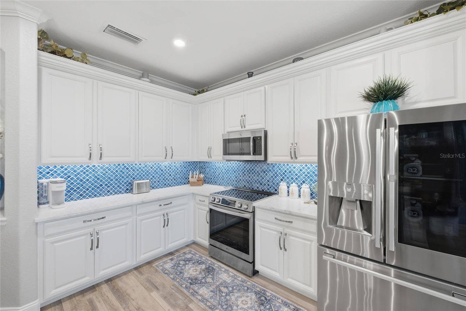 6726 ROOKERY LAKE DRIVE, Bradenton, FL 34212 Kitchen with Stainless Steel Appliances