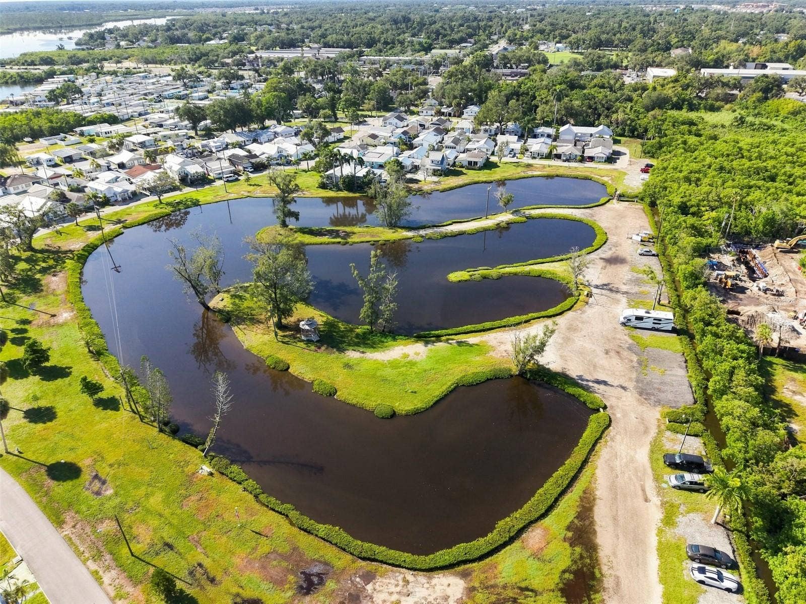 8 PLAZA STREET E, Bradenton, FL 34208 Lagoon area with RV Storage.