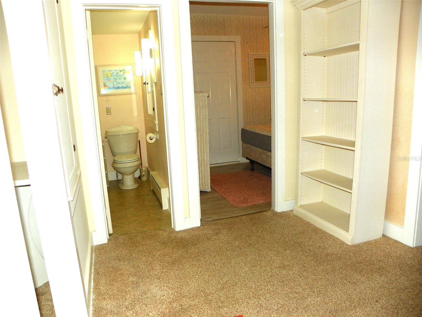 8 PLAZA STREET E, Bradenton, FL 34208 Off Dining Room. Bedroom 1 on right.