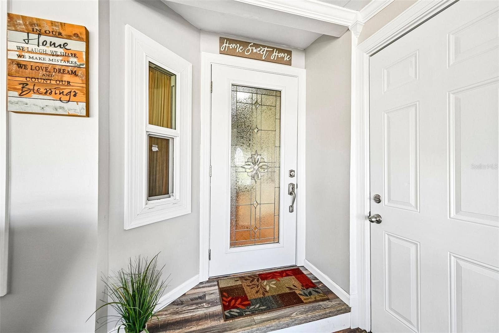 8510 COUNTESS AVENUE CIRCLE, Palmetto, FL 34221 Inner Front Door & Garage Door on the right